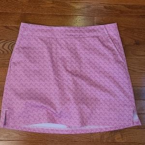 Pink pattern golf skort.